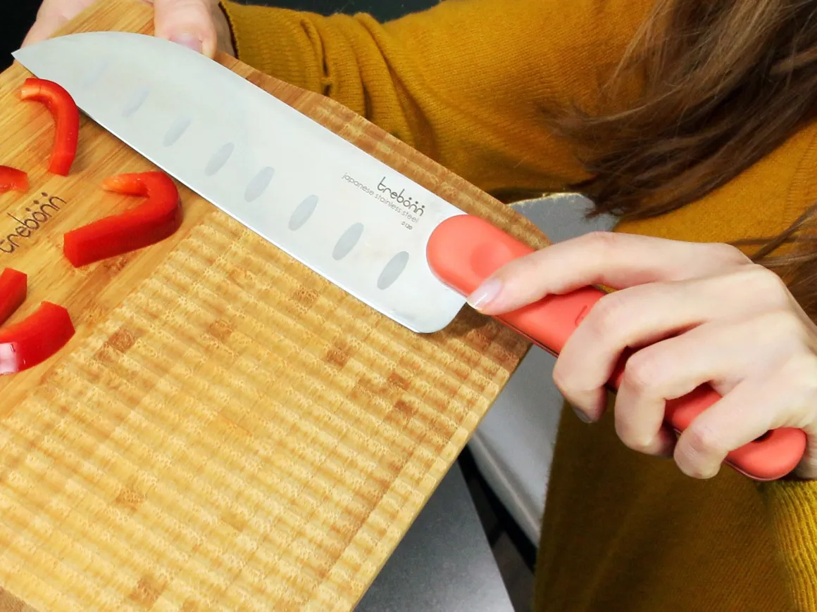COLTELLO DA CUCINA SANTOKU KNIFE IN ACCIAO INOX MANICO ARANCIO